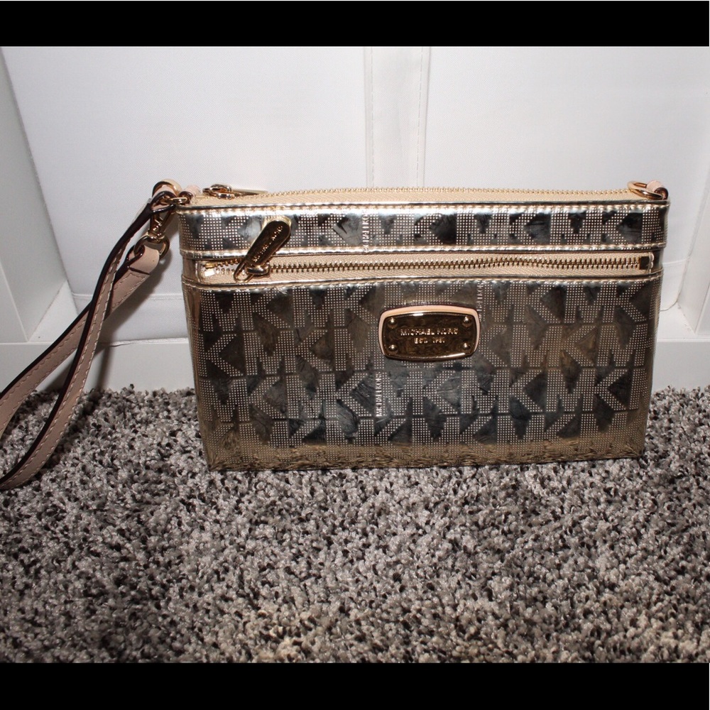 Michael Kors gold clutch/wristlet